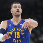 Apr 12, 2026; San Antonio, Texas, USA; Denver Nuggets center Nikola Jokic (15) signals to teammates during the first half against the San Antonio Spurs at Frost Bank Center. Mandatory Credit: Scott Wachter-Imagn Images