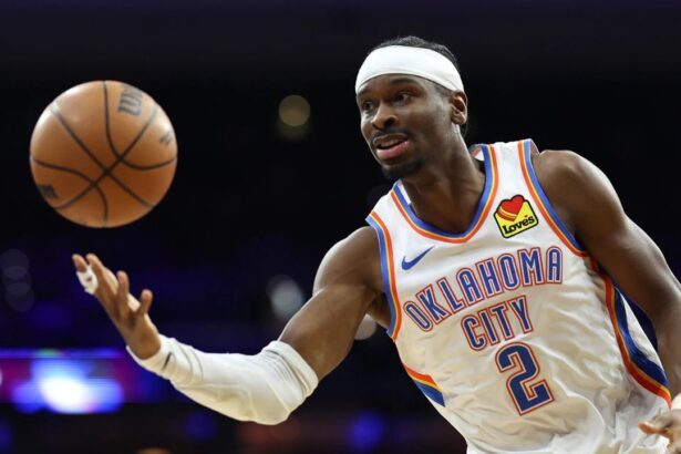 Mar 23, 2026; Philadelphia, Pennsylvania, USA; Oklahoma City Thunder guard Shai Gilgeous-Alexander (2) passes the ball against the Philadelphia 76ers during the third quarter at Xfinity Mobile Arena. Mandatory Credit: Bill Streicher-Imagn Images