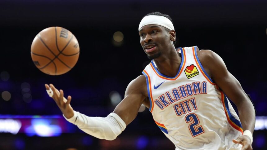Mar 23, 2026; Philadelphia, Pennsylvania, USA; Oklahoma City Thunder guard Shai Gilgeous-Alexander (2) passes the ball against the Philadelphia 76ers during the third quarter at Xfinity Mobile Arena. Mandatory Credit: Bill Streicher-Imagn Images