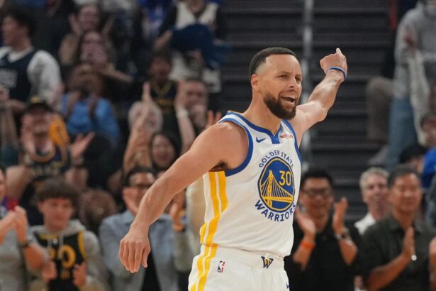 Apr 5, 2026; San Francisco, California, USA; Golden State Warriors guard Stephen Curry (30) reacts after making a three point basket against the Houston Rockets in the first quarter at the Chase Center. Mandatory Credit: Cary Edmondson-Imagn Images