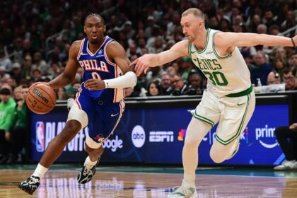 Apr 19, 2026; Boston, Massachusetts, USA; Philadelphia 76ers guard Tyrese Maxey (0) controls the ball while Boston Celtics forward Sam Hauser (30) defends in the first half during game one of the first round of the 2026 NBA Playoffs at TD Garden. Mandatory Credit: Bob DeChiara-Imagn Images