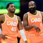Cleveland Cavaliers guard Donovan Mitchell (45) and guard James Harden (1) talk during a free throw attempt during the second half against the Orlando Magic at Rocket Arena.