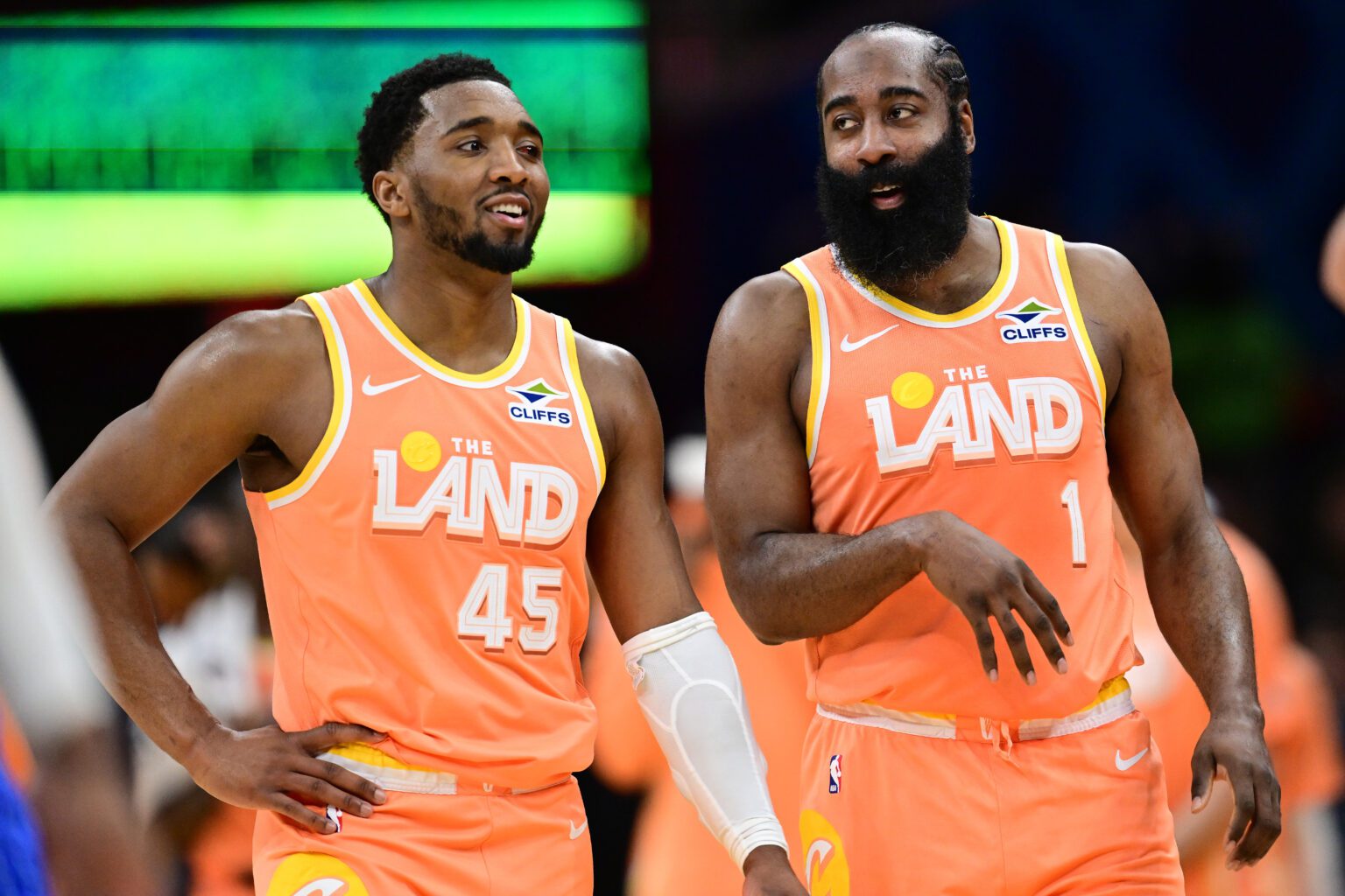 Cleveland Cavaliers guard Donovan Mitchell (45) and guard James Harden (1) talk during a free throw attempt during the second half against the Orlando Magic at Rocket Arena.