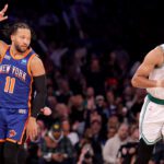 New York Knicks guard Jalen Brunson (11) celebrates his three point shot against Boston Celtics forward Jayson Tatum