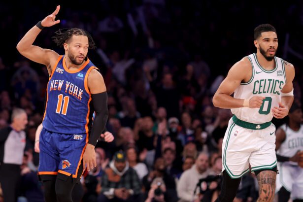 New York Knicks guard Jalen Brunson (11) celebrates his three point shot against Boston Celtics forward Jayson Tatum