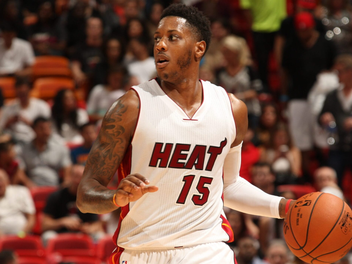 Mario Chalmers #15 of the Miami Heat handles the ball against the Memphis Grizzlies on December 27, 2014 at American Airlines Arena in Miami, Florida. NOTE TO USER: User expressly acknowledges and agrees that, by downloading and or using this Photograph, user is consenting to the terms and conditions of the Getty Images License Agreement. Mandatory Copyright Notice: Copyright 2014 NBAE (Photo by Issac Baldizon/NBAE via Getty Images)
