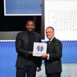 Mark Tatum the NBA Deputy Commissioner and Washington Wizard (left) guard John Wall pose for photos after Wizards won the 2026 NBA Draft Lottery at Navy Pier.