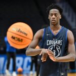 Mar 18, 2026; Portland, OR, USA; BYU Cougars forward AJ Dybantsa (3) passes the ball during a practice session ahead of the first round of the men's 2026 NCAA Tournament at Moda Center. Mandatory Credit: Craig Strobeck-Imagn Images