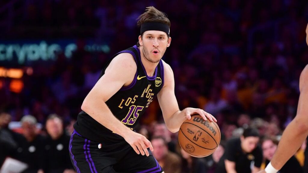 Los Angeles, California, USA; Los Angeles Lakers guard Austin Reaves (15) moves the ball against Oklahoma City Thunder forward Jaylin Williams (6) during the first half in game four of the second round of the 2026 NBA Playoffs at Crypto.com Arena. Mandatory Credit: Gary A. Vasquez-Imagn Images