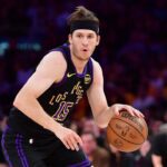 May 11, 2026; Los Angeles, California, USA; Los Angeles Lakers guard Austin Reaves (15) moves the ball against Oklahoma City Thunder forward Jaylin Williams (6) during the first half in game four of the second round of the 2026 NBA Playoffs at Crypto.com Arena. Mandatory Credit: Gary A. Vasquez-Imagn Images