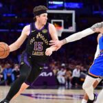 May 11, 2026; Los Angeles, California, USA; Los Angeles Lakers guard Austin Reaves (15) moves the ball against Oklahoma City Thunder center Isaiah Hartenstein (55) during the first half in game four of the second round of the 2026 NBA Playoffs at Crypto.com Arena. Mandatory Credit: Gary A. Vasquez-Imagn Images