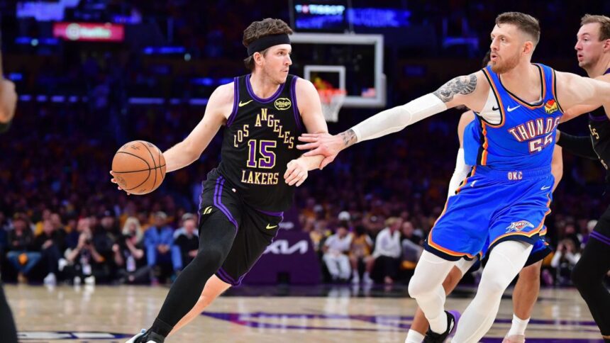 May 11, 2026; Los Angeles, California, USA; Los Angeles Lakers guard Austin Reaves (15) moves the ball against Oklahoma City Thunder center Isaiah Hartenstein (55) during the first half in game four of the second round of the 2026 NBA Playoffs at Crypto.com Arena. Mandatory Credit: Gary A. Vasquez-Imagn Images