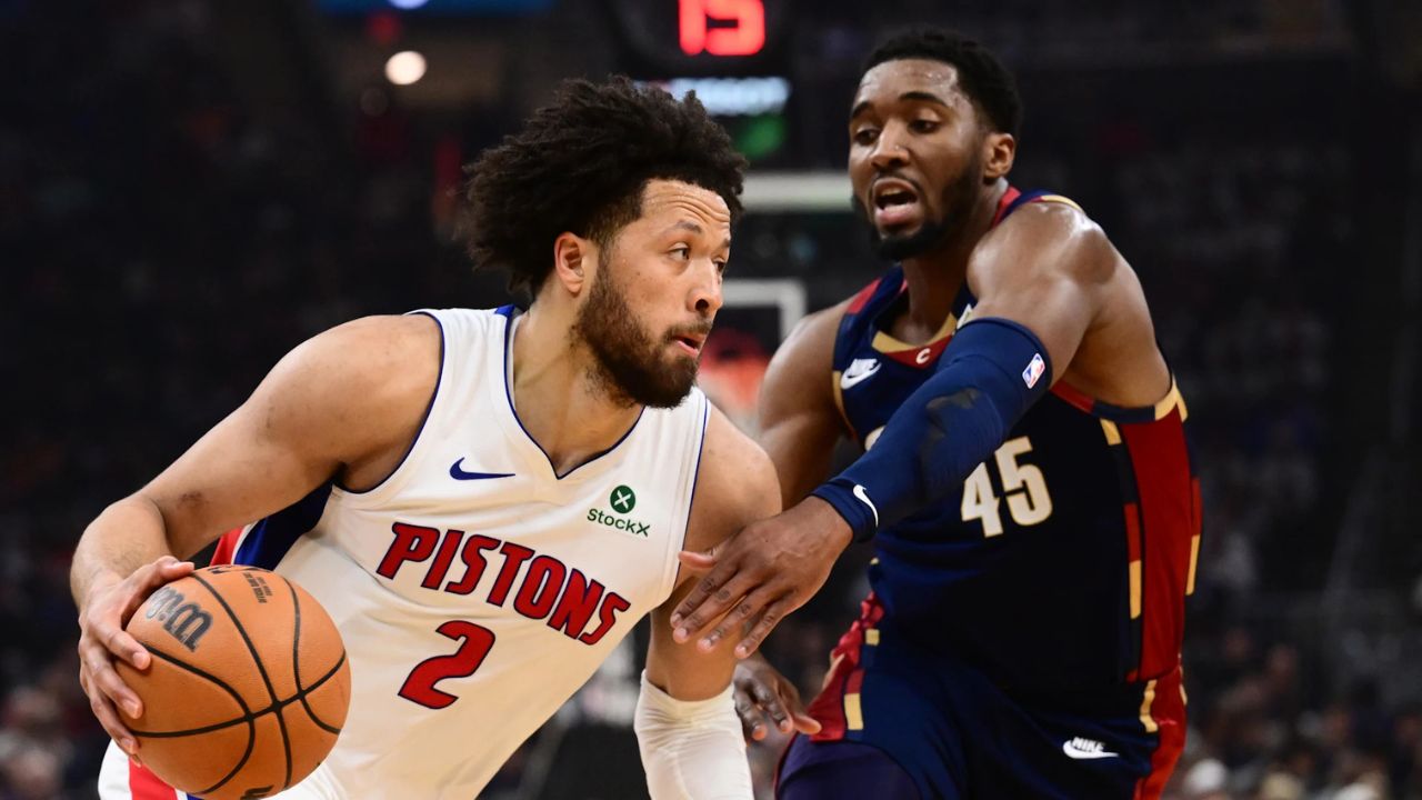 May 11, 2026; Cleveland, Ohio, USA; Detroit Pistons guard Cade Cunningham (2) drives to the basket against Cleveland Cavaliers guard Donovan Mitchell (45) during the first half of game four in the second round of the 2026 NBA Playoffs at Rocket Arena. Mandatory Credit: Ken Blaze-Imagn Images
