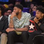 Mar 30, 2026; Los Angeles, California, USA; Washington Wizards forward Anthony Davis (23), center, looks on from the bench during the first half against the Los Angeles Lakers at Crypto.com Arena. Mandatory Credit: Jayne Kamin-Oncea-Imagn Images