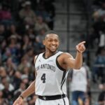 Mar 8, 2026; San Antonio, Texas, USA; San Antonio Spurs guard De'aaron Fox (4) celebrates in the second half against the Houston Rockets at Frost Bank Center. Mandatory Credit: Daniel Dunn-Imagn Images