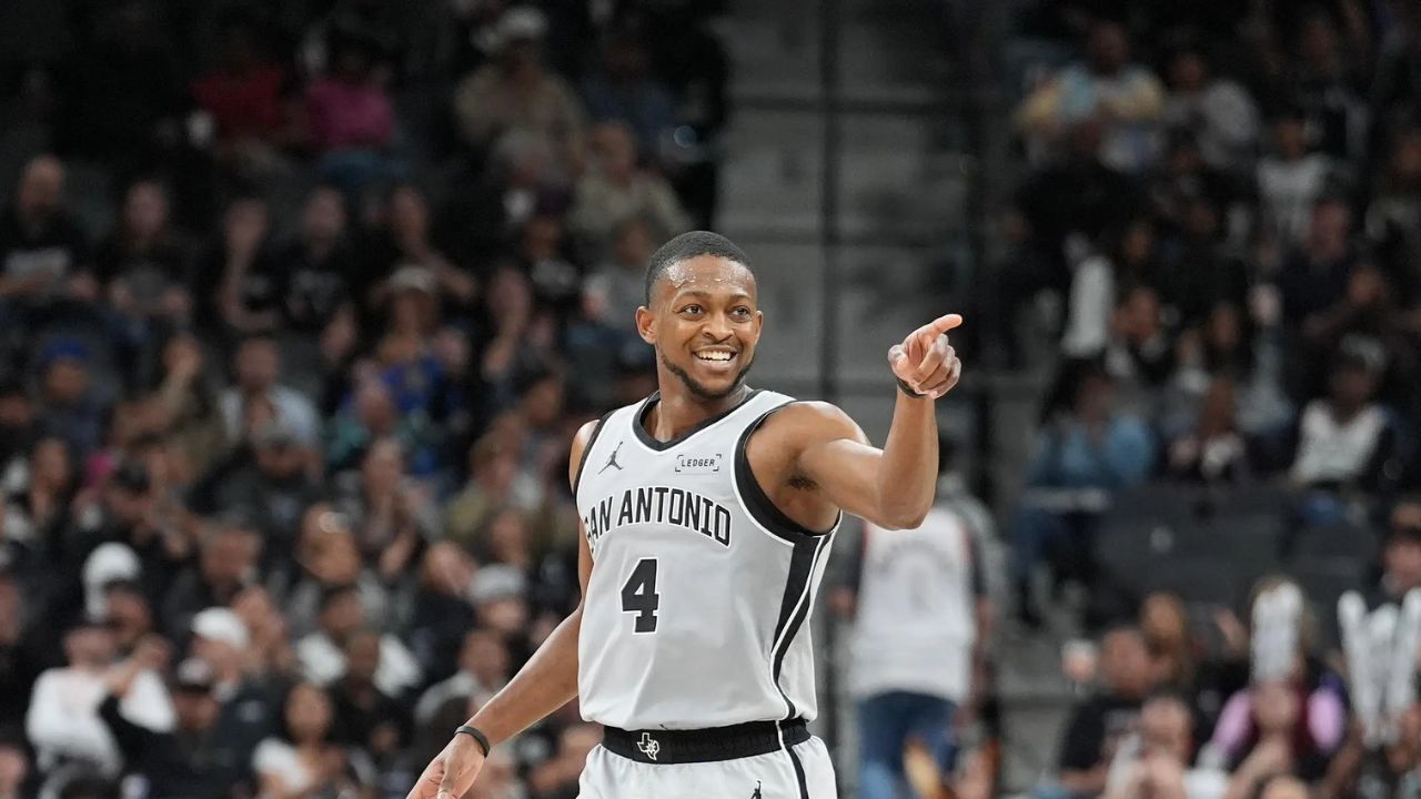 Mar 8, 2026; San Antonio, Texas, USA; San Antonio Spurs guard De'aaron Fox (4) celebrates in the second half against the Houston Rockets at Frost Bank Center. Mandatory Credit: Daniel Dunn-Imagn Images