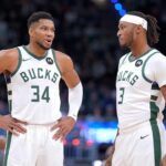 MILWAUKEE, WISCONSIN - NOVEMBER 09: Giannis Antetokounmpo #34 and Myles Turner #3 of the Milwaukee Bucks talk with each other during the game against the Houston Rockets at Fiserv Forum on November 09, 2025 in Milwaukee, Wisconsin. (Photo by John Fisher/Getty Images)