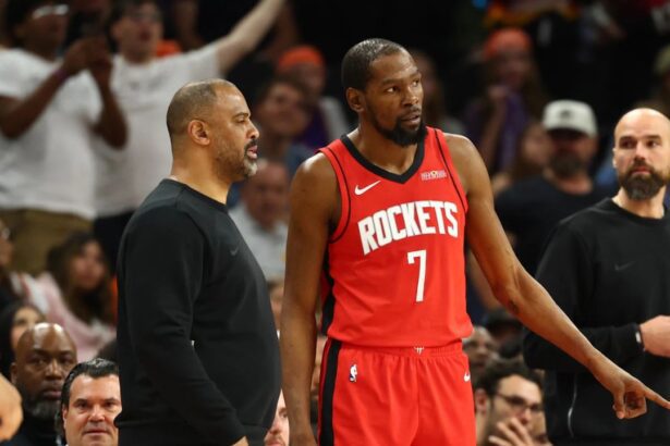 Apr 7, 2026; Phoenix, Arizona, USA; Houston Rockets head coach Ime Udoka with forward Kevin Durant (7) against the Phoenix Suns at Mortgage Matchup Center. Mandatory Credit: Mark J. Rebilas-Imagn Images