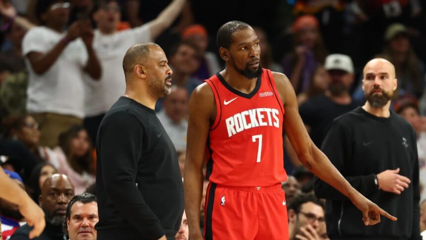 Apr 7, 2026; Phoenix, Arizona, USA; Houston Rockets head coach Ime Udoka with forward Kevin Durant (7) against the Phoenix Suns at Mortgage Matchup Center. Mandatory Credit: Mark J. Rebilas-Imagn Images