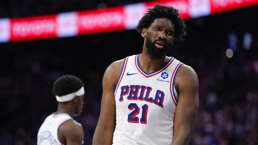 May 10, 2026; Philadelphia, Pennsylvania, USA; Philadelphia 76ers center Joel Embiid (21) reacts against the New York Knicks in the second quarter during game four of the second round of the 2026 NBA Playoffs at Xfinity Mobile Arena. Mandatory Credit: Kyle Ross-Imagn Images