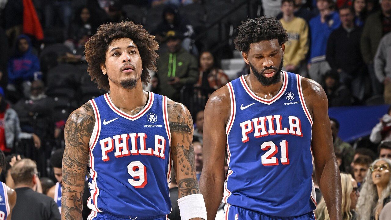 PHILADELPHIA, PA - DECEMBER 18: Kelly Oubre Jr. #9 and Joel Embiid #21 of the Philadelphia 76ers of the Philadelphia 76ers look on during the game against the Chicago Bulls on December 18, 2023 at the Wells Fargo Center in Philadelphia, Pennsylvania (Photo by David Dow/NBAE via Getty Images)