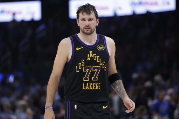 Apr 2, 2026; Oklahoma City, Oklahoma, USA; Los Angeles Lakers guard Luka Doncic (77) stands on the court during the second half against the Oklahoma City Thunder at Paycom Center. Mandatory Credit: Alonzo Adams-Imagn Images