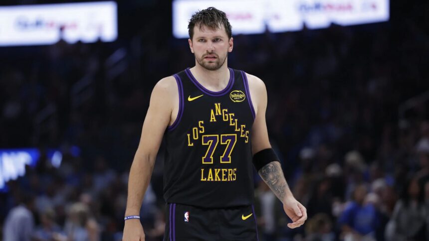 Apr 2, 2026; Oklahoma City, Oklahoma, USA; Los Angeles Lakers guard Luka Doncic (77) stands on the court during the second half against the Oklahoma City Thunder at Paycom Center. Mandatory Credit: Alonzo Adams-Imagn Images