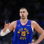 Apr 20, 2026; Denver, Colorado, USA; Denver Nuggets center Nikola Jokic (15) reacts towards the bench in the second half against the Minnesota Timberwolves during game two of the first round of the 2026 NBA Playoffs at Ball Arena. Mandatory Credit: Ron Chenoy-Imagn Images