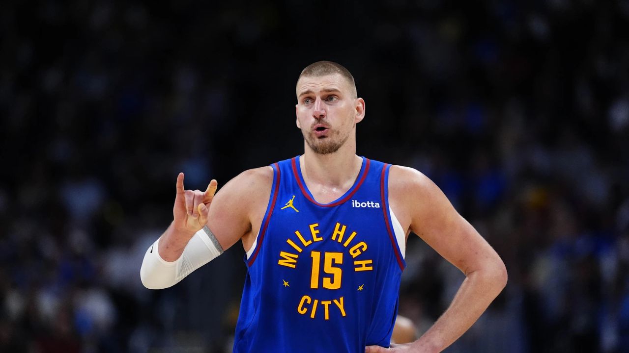 Apr 20, 2026; Denver, Colorado, USA; Denver Nuggets center Nikola Jokic (15) reacts towards the bench in the second half against the Minnesota Timberwolves during game two of the first round of the 2026 NBA Playoffs at Ball Arena. Mandatory Credit: Ron Chenoy-Imagn Images