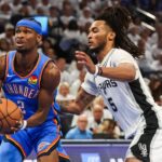 May 20, 2026; Oklahoma City, Oklahoma, USA; Oklahoma City Thunder guard Shai Gilgeous-Alexander (2) drives to the basket as San Antonio Spurs guard Stephon Castle (5) defends during the third quarter during game two of the western conference finals for the 2026 NBA playoffs at Paycom Center. Mandatory Credit: Brett Rojo-Imagn Images