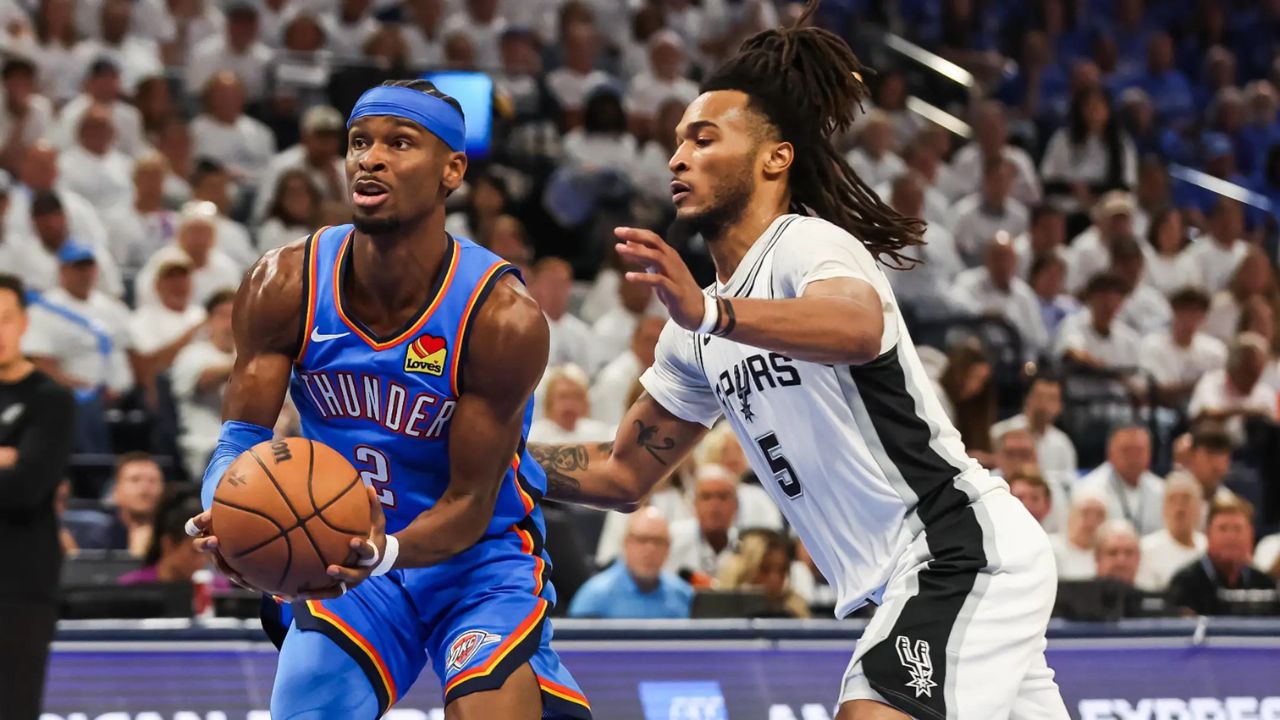 May 20, 2026; Oklahoma City, Oklahoma, USA; Oklahoma City Thunder guard Shai Gilgeous-Alexander (2) drives to the basket as San Antonio Spurs guard Stephon Castle (5) defends during the third quarter during game two of the western conference finals for the 2026 NBA playoffs at Paycom Center. Mandatory Credit: Brett Rojo-Imagn Images
