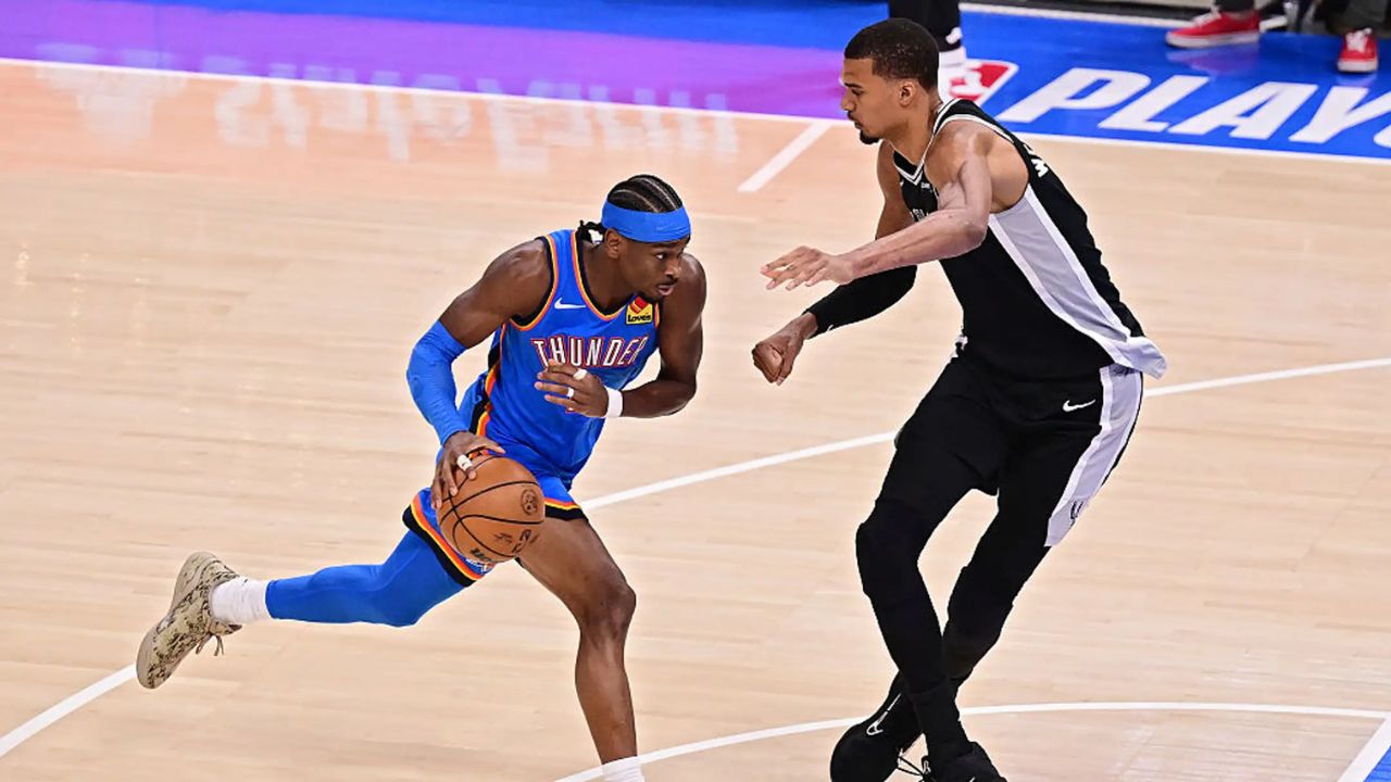 OKLAHOMA CITY, OKLAHOMA - MAY 18: Shai Gilgeous-Alexander #2 of the Oklahoma City Thunder drives to the basket against Victor Wembanyama #1 of the San Antonio Spurs during the first quarter in Game One of the NBA Western Conference Finals at Paycom Center on May 18, 2026 in Oklahoma City, Oklahoma. (Photo by Joshua Gateley/Getty Images)