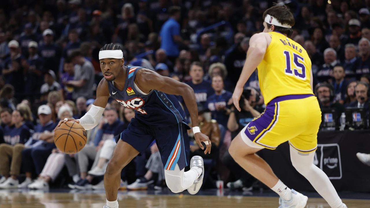 May 7, 2026; Oklahoma City, Oklahoma, USA; Oklahoma City Thunder guard Shai Gilgeous-Alexander (2) drives down the court against Los Angeles Lakers guard Austin Reaves (15) in the second half during game two of the second round of the 2026 NBA Playoffs at Paycom Center. Mandatory Credit: Alonzo Adams-Imagn Images