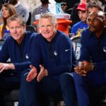 Steve Kerr sits amid the Warriors' assistant coaching staff. Mandatory Credit: Adam Pantozzi/NBAE via Getty Images