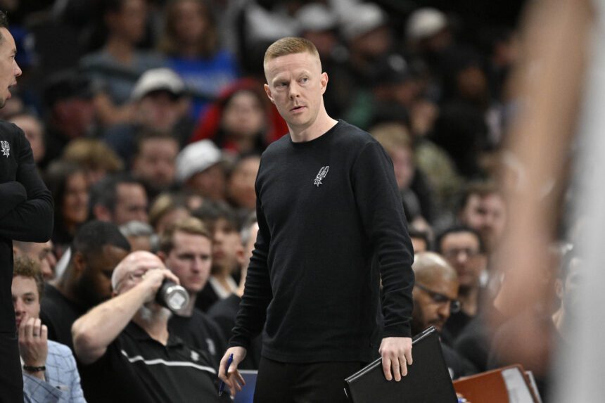 San Antonio Spurs associate coach Sean Sweeney looks on during the second half against the Dallas Mavericks at the American Airlines Center.