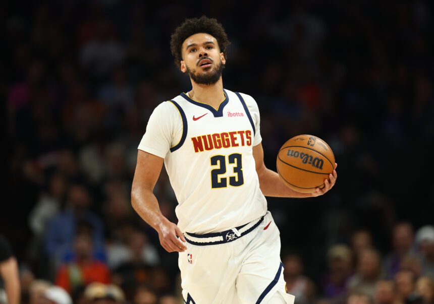 Denver Nuggets forward Cameron Johnson (23) against the Phoenix Suns at Mortgage Matchup Center.