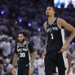 San Antonio Spurs forward Victor Wembanyama (1) reacts after a play during the third quarter against the Oklahoma City Thunder in game five of the western conference finals for the 2026 NBA playoffs at Paycom Center.