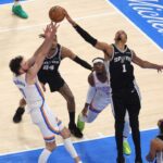 May 26, 2026; Oklahoma City, Oklahoma, USA; San Antonio Spurs forward Victor Wembanyama (1) blocksOklahoma City Thunder center Chet Holmgren (7) during the second quarter in game five of the western conference finals for the 2026 NBA playoffs at Paycom Center. Mandatory Credit: Brett Rojo-Imagn Images