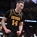 Mar 26, 2026; Houston, TX, USA;Iowa Hawkeyes guard Bennett Stirtz (14) reacts after beating the Nebraska Cornhuskers during a Sweet Sixteen game of the South Regional of the men's 2026 NCAA Tournament at Toyota Center. Mandatory Credit: Maria Lysaker-Imagn Images