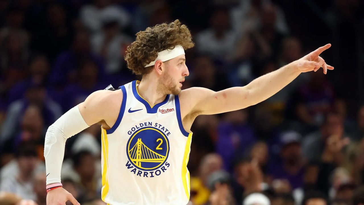 Apr 17, 2026; Phoenix, Arizona, USA; Golden State Warriors guard Brandin Podziemski (2) reacts against the Phoenix Suns during the first half in the play-in rounds of the 2026 NBA Playoffs at Mortgage Matchup Center. Mandatory Credit: Mark J. Rebilas-Imagn Images
