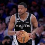 Jun 10, 2026; New York, New York, USA; San Antonio Spurs guard De'aaron Fox (4) controls the ball against the New York Knicks during the fourth quarter of game four of the 2026 NBA Finals at Madison Square Garden. Mandatory Credit: Brad Penner-Imagn Images
