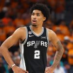 SAN ANTONIO, TEXAS - JUNE 03: Dylan Harper #2 of the San Antonio Spurs reacts during the second quarter against the New York Knicks in Game One of the 2026 NBA Finals at Frost Bank Center on June 03, 2026 in San Antonio, Texas. (Photo by Gregory Shamus/Getty Images)