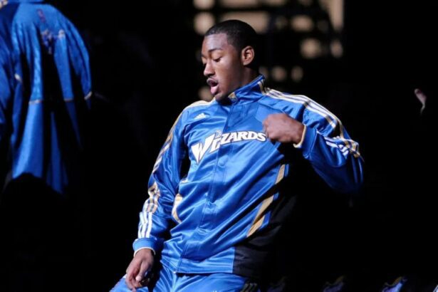 November 2, 2010; Washington, DC, USA; Washington Wizards point guard John Wall dances during the player introductions before a game against the Philadelphia 76ers at the Verizon Center. Mandatory Credit: Rafael Suanes-Imagn Images