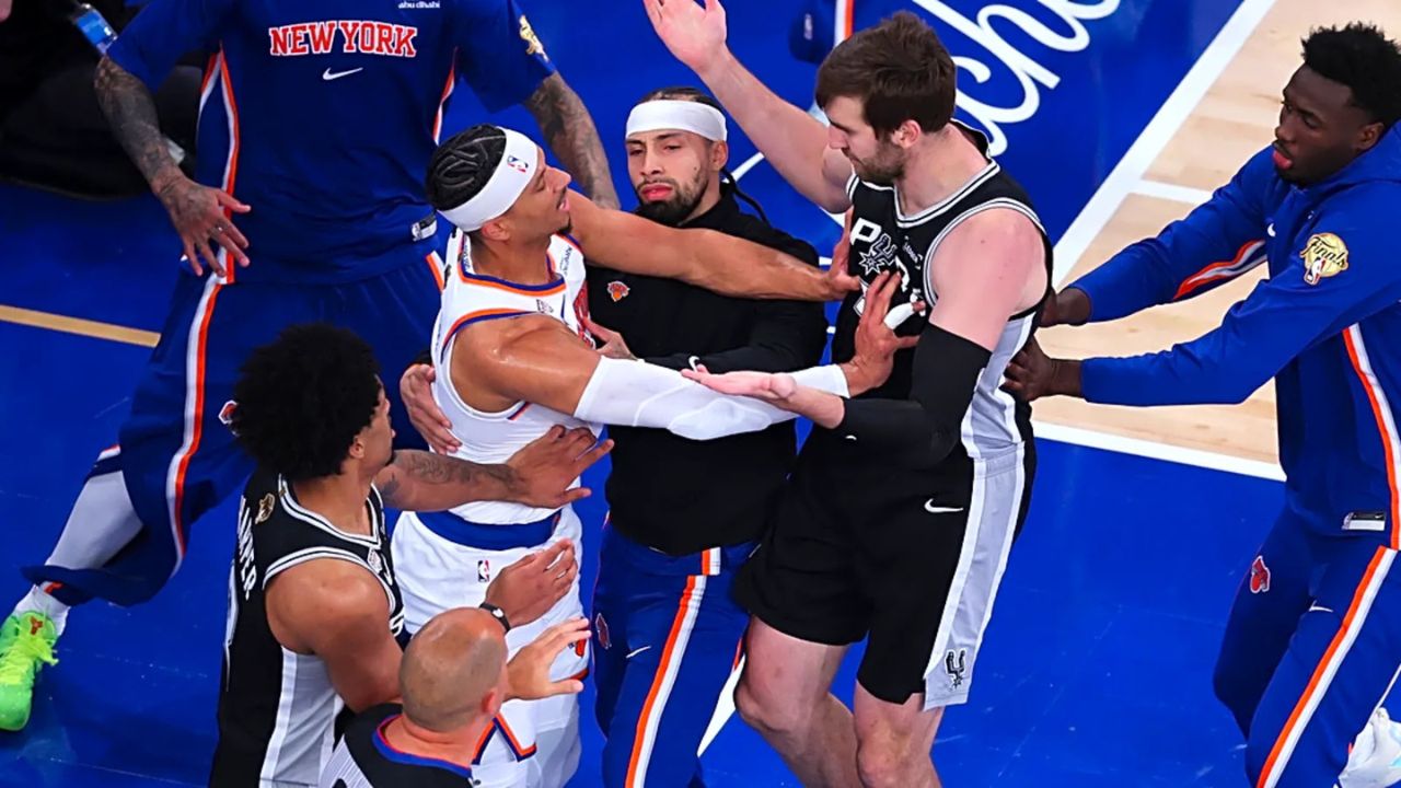 Jun 8, 2026; New York, New York, USA; New York Knicks guard Josh Hart (3) pushes San Antonio Spurs center Luke Kornet (7) after the whistle during game three of the 2026 NBA Finals in the first quarter at Madison Square Garden. Mandatory Credit: Wendell Cruz-Imagn Images