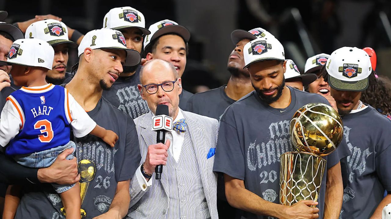 SAN ANTONIO, TEXAS - JUNE 13: Ernie Johnson Jr. interviews Josh Hart #3 and Mikal Bridges #25 of the New York Knicks after the victory against the San Antonio Spurs in Game Five of the 2026 NBA Finals at Frost Bank Center on June 13, 2026 in San Antonio, Texas. (Photo by Gregory Shamus/Getty Images)