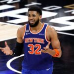 SAN ANTONIO, TEXAS - JUNE 05: Karl-Anthony Towns #32 of the New York Knicks reacts during the third quarter against the San Antonio Spurs in Game Two of the 2026 NBA Finals at Frost Bank Center on June 05, 2026 in San Antonio, Texas. (Photo by Ronald Cortes/Getty Images)
