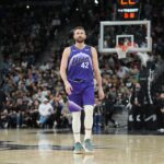 Jan 19, 2026; San Antonio, Texas, USA; Utah Jazz forward Kevin Love (42) walks up the court in the first half against the San Antonio Spurs at Frost Bank Center. Mandatory Credit: Daniel Dunn-Imagn Images