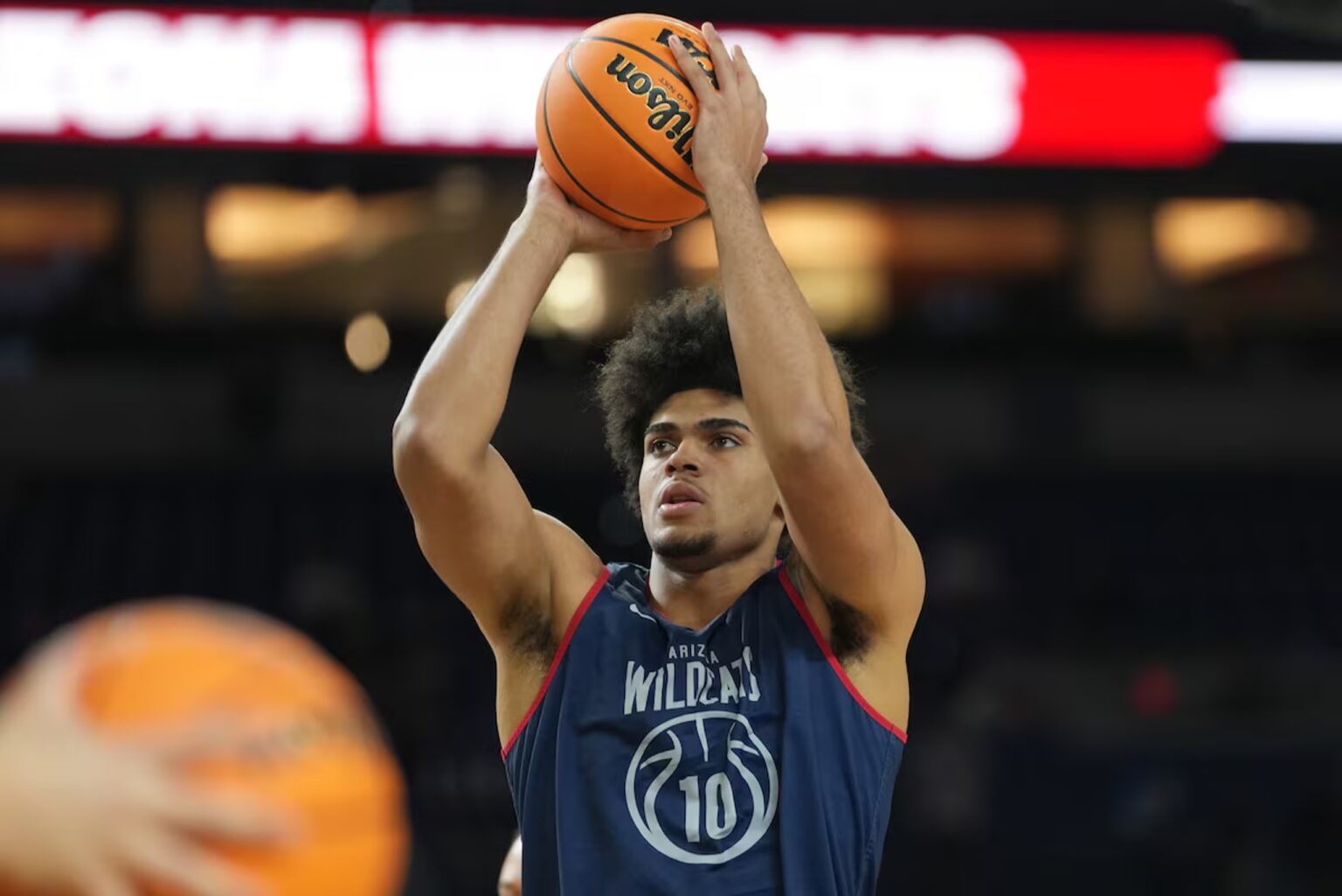 Apr 3, 2026; Indianapolis, IN, USA; Arizona Wildcats forward Koa Peat (10) holds a ball during a practice session ahead of the Final Four of the men's 2026 NCAA Tournament at Lucas Oil Stadium. Mandatory Credit: Robert Deutsch-Imagn Images