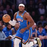 Mar 4, 2026; New York, New York, USA; Oklahoma City Thunder guard Luguentz Dort (5) dribbles up court against the New York Knicks during the first half at Madison Square Garden. Mandatory Credit: Vincent Carchietta-Imagn Images