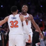 Jun 10, 2026; New York, New York, USA; New York Knicks forward Og Anunoby (8) and center Karl-Anthony Towns (32) react in the fourth quarter against the San Antonio Spurs during game four of the 2026 NBA Finals at Madison Square Garden. Mandatory Credit: Brad Penner-Imagn Images